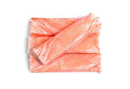 Crab sticks, krab sticks, imitation crab meat or seafood sticks. Isolated on white.の写真素材