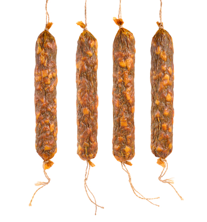 Homemade drying sausage. Isolated on white backgroundの写真素材