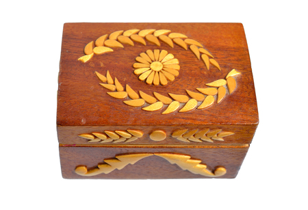 Small wooden handmade casket. Isolated on white background.の写真素材