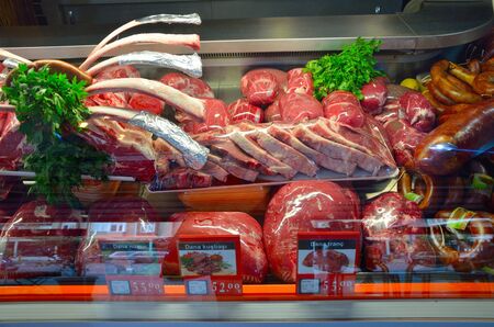 Showcase with raw meat in butcher shopの写真素材