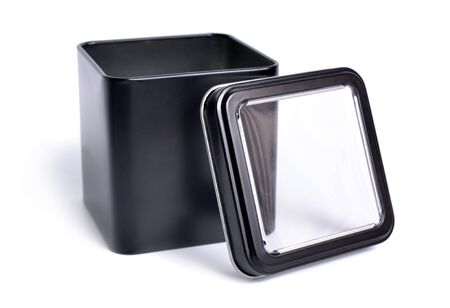 Black metal box with a transparent lid isolated on whiteの写真素材
