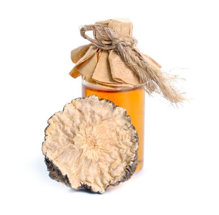 Dried sliced Lepidium meyenii, known as maca or Peruvian ginseng. Isolated on white backgroundの写真素材