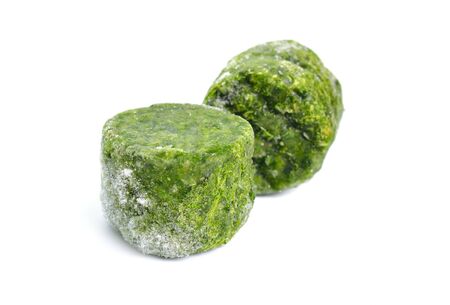 Frozen Spinach leaves. Isolated on white background.の写真素材