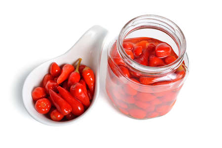 Small hot red chili pickled isolated on white backgroundの写真素材