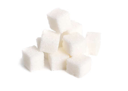 Heap of Sugar cubes isolated on white backgroundの写真素材