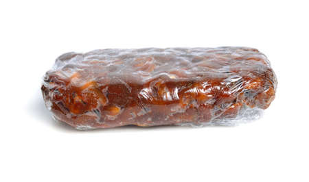 Briquette of ripe Peeled tamarind isolated on white baclgroundの写真素材