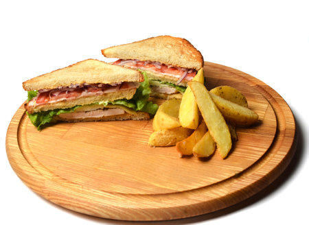 Sandwich with baked potatoes on a wooden board isolated on white background. Restaurated food. Fast food.の写真素材