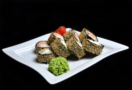 Sushi roll banzai. Hot roll philadelphia with shrimp on a plate.の写真素材