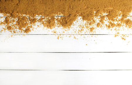 Sand on a white wooden surface. Wood texture. The concept of relaxing at sea. Summer beach season is open! Top view.の写真素材