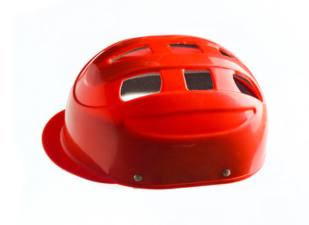 Red protective helmet for roller skaters and cyclists isolated on whiteの写真素材