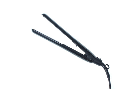 Hair straightener isolated on white background.