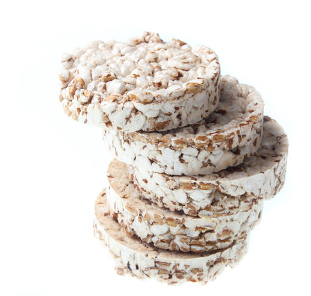 Diet crispy round bread isolated on white background.の写真素材