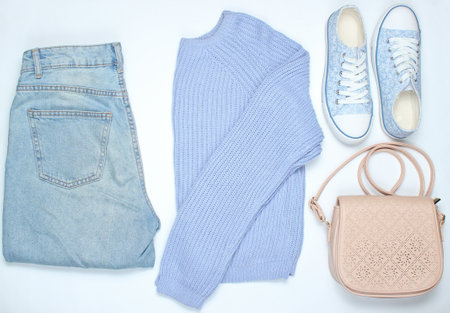 Flat lay style clothes and accessories on white background. Top viewの写真素材