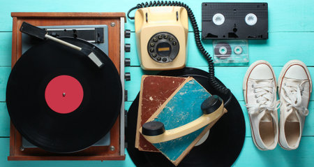 Obsolete objects on the Blue wooden background. Retro style, 80s, pop mediaの写真素材