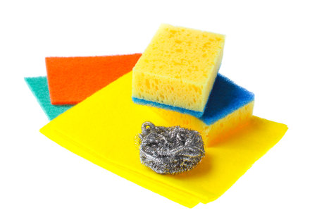 Housewife home cleaning kit isolated on white background. Sponges, abrasives.の写真素材