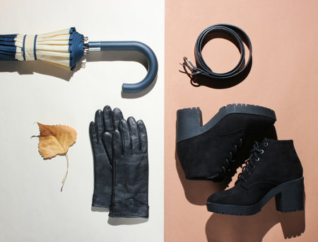 Trendy women's seasonal accessories on a beige-brown background. Top view, minimalismの写真素材