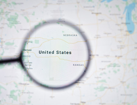 UKRAINE, ODESSA - APRIL 25, 2019: United States on google maps through magnifying glassのeditorial素材
