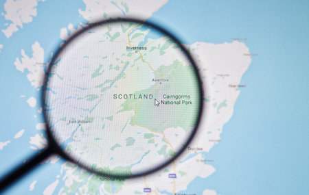 UKRAINE, ODESSA - APRIL 25, 2019: Scotland on google maps through magnifying glassのeditorial素材
