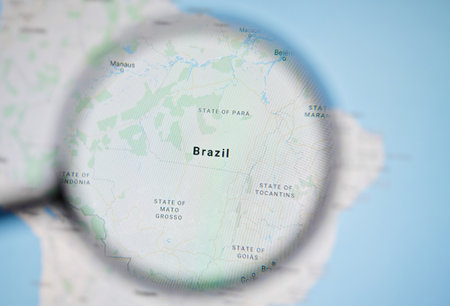 UKRAINE, ODESSA - APRIL 25, 2019: Brazil on google maps through magnifying glassのeditorial素材