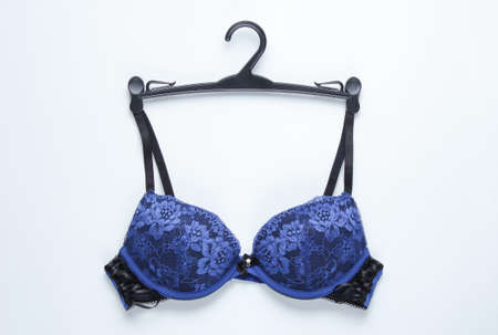 Sexy bra with hanger on white background. Top viewの写真素材