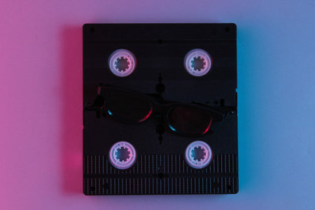 Video cassette. Neon light. Retro style 80sの写真素材