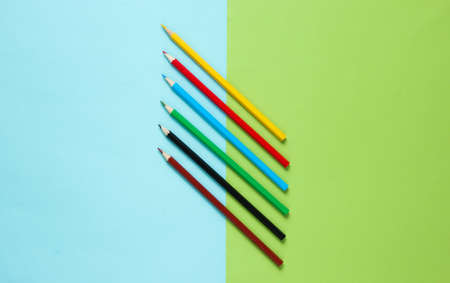 Set of colored pencils on pastel background. Top viewの写真素材