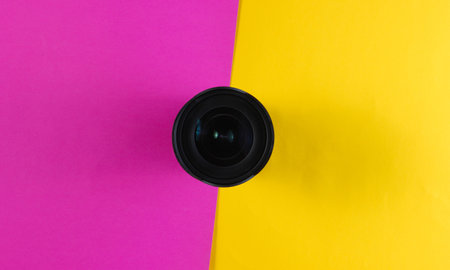 Lens on a colored paper background.の素材 [FY310163611791]