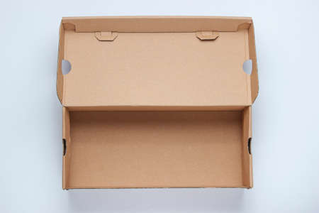 Empty cardboard box on white background. Top view