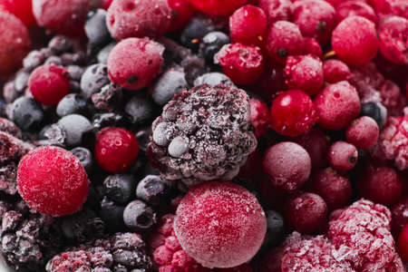 Frozen berries closeup. Cherries, currants, blueberries, blackberriesの写真素材