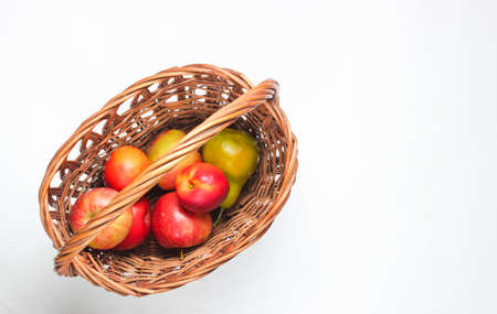 picnic basket filled with fruits on a white background. Top viewの写真素材