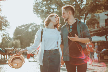Romantic youth concept. Young stylish hipster couple in love at the city.の写真素材