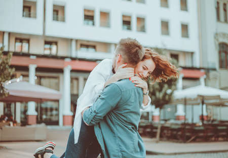 Romantic youth concept. Young stylish hipster couple in love at the city.の写真素材