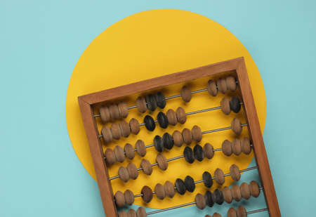 Retro abacus on a pastel color background. Top view. Minimalismの写真素材