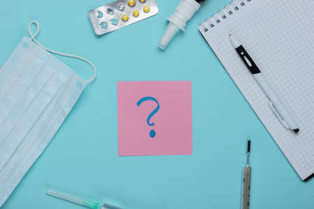 Medical still life on blue studio background. Top view.の写真素材