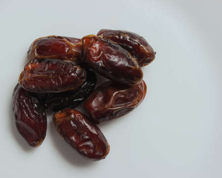 Dried dates on a white background. Dried fruitsの写真素材