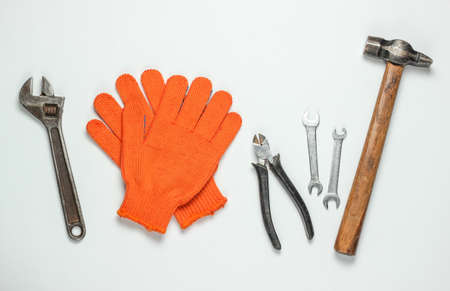 Set of professional work tools on a white background. Top viewの写真素材