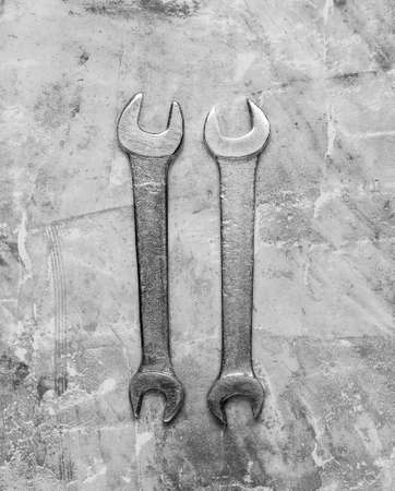 Two Wrench on gray concrete background. Work tool. Top viewの写真素材