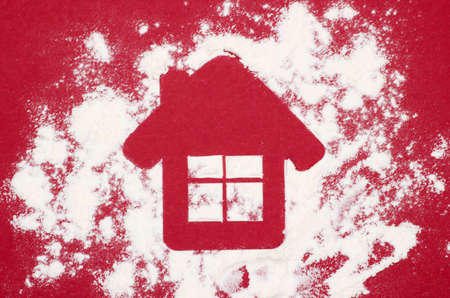 House shape on red background. Top viewの写真素材
