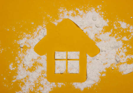 House shape on a yellow background. Top viewの写真素材