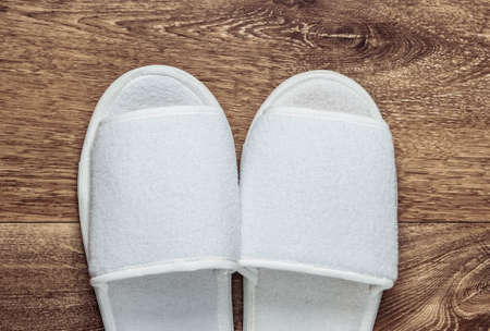 White slippers on the floor. Top viewの写真素材