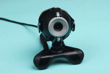 Webcam close-up on a blue background. I see you!の写真素材