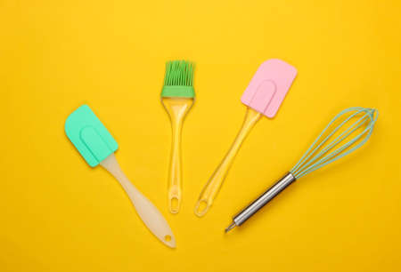 Flat lay compoisition of kitchen tools on yellow background. Minimalism. Top viewの写真素材
