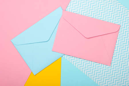 Envelopes with romantic letters on a pastel background. Top viewの写真素材