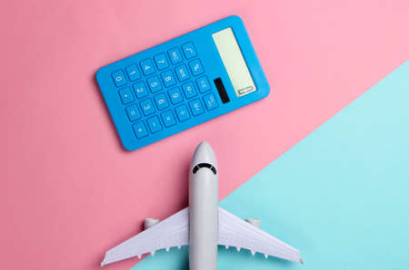 Calculation of the cost of travel, air travel or air delivery. Calculator with airplane figure on...