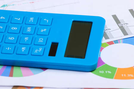 calculator with graphs and charts. Analytics, statistics, economic calculationの写真素材