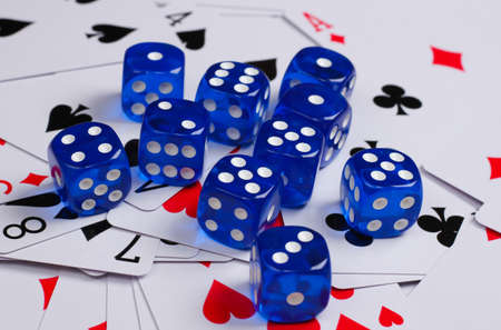 Dice with playing cards. Gaming addiction, poker, casino