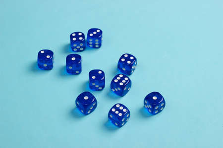 Many dice on a blue backgroundの写真素材