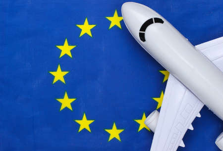 Figurine of airplane with Euro Union flag. Air travelの写真素材