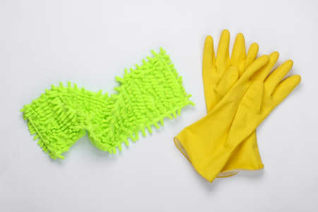 Rag for cleaning, gloves on a white background. Top viewの写真素材