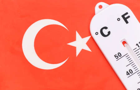 National Ambient Temperature Control. Weather thermometer on the background of Turkish flag. Global warming conceptの写真素材